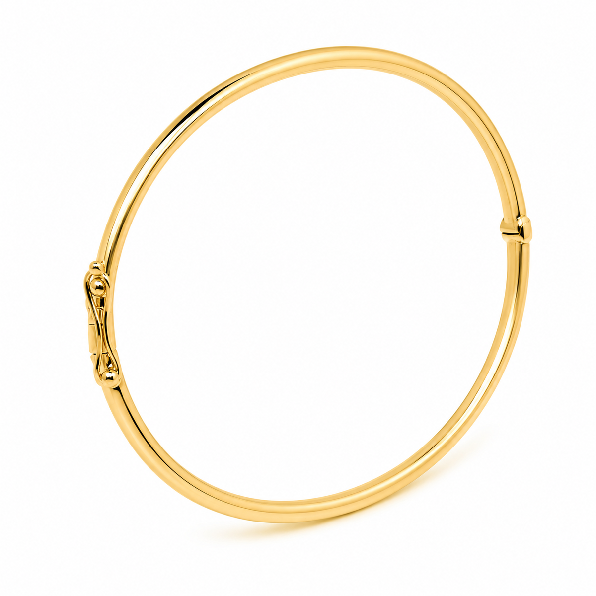 14k Gold bangle bracelet on a white background