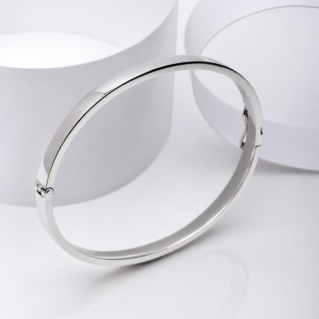 14k white Gold bangle bracelet on a white background