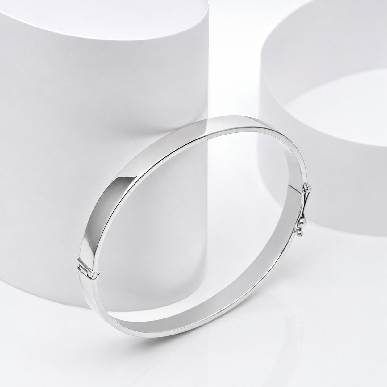 14k white Gold bangle bracelet on a white background