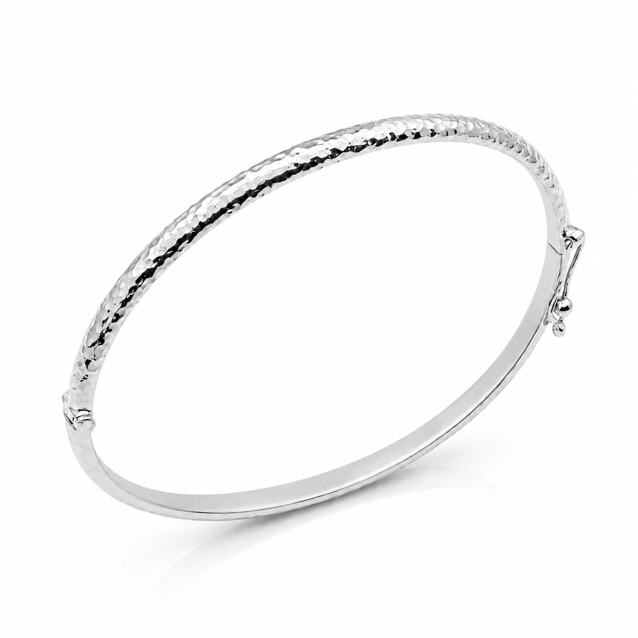 14k white Gold hammered bangle on a white background