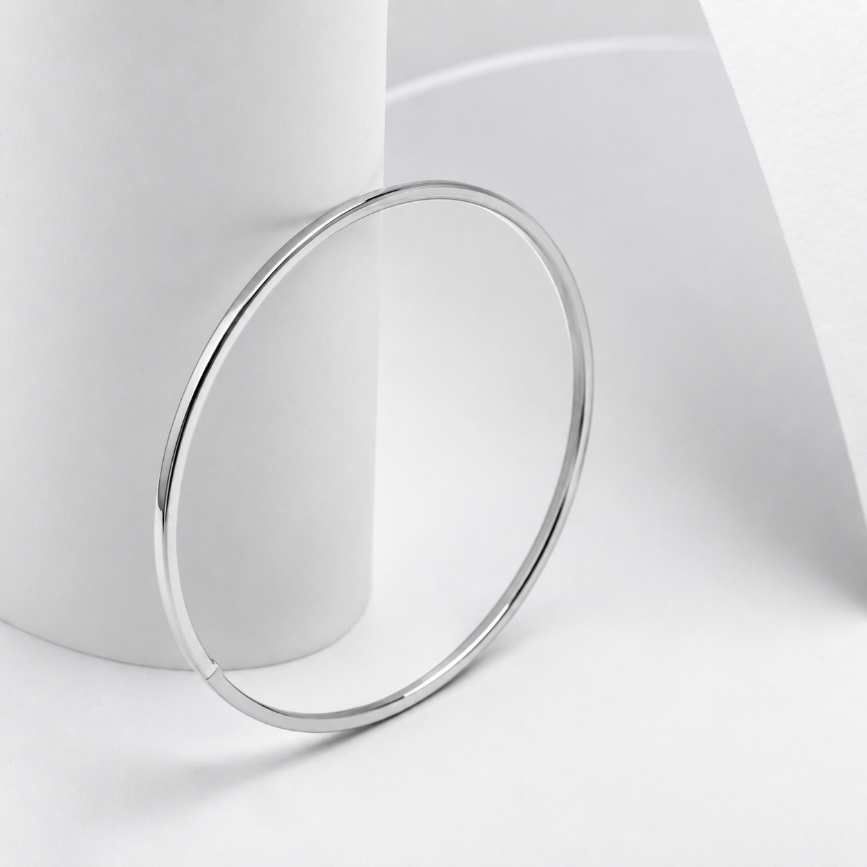 14k white gold slip on bangle bracelet on a white background