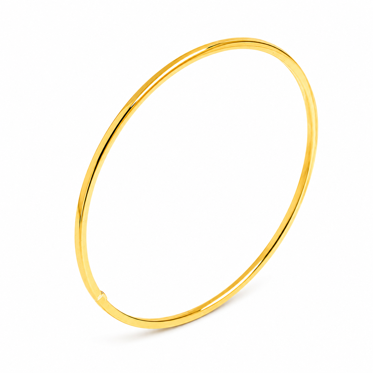 14k yellow gold slip on bangle bracelet on a white background