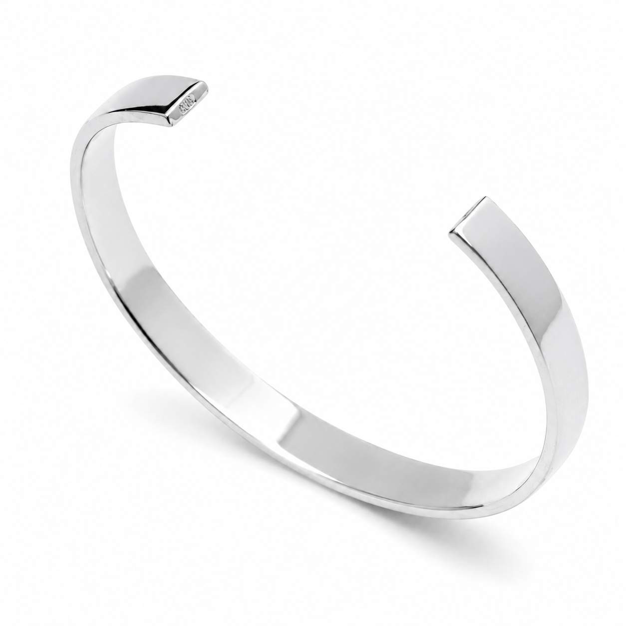 14k white Gold bangle on a white background