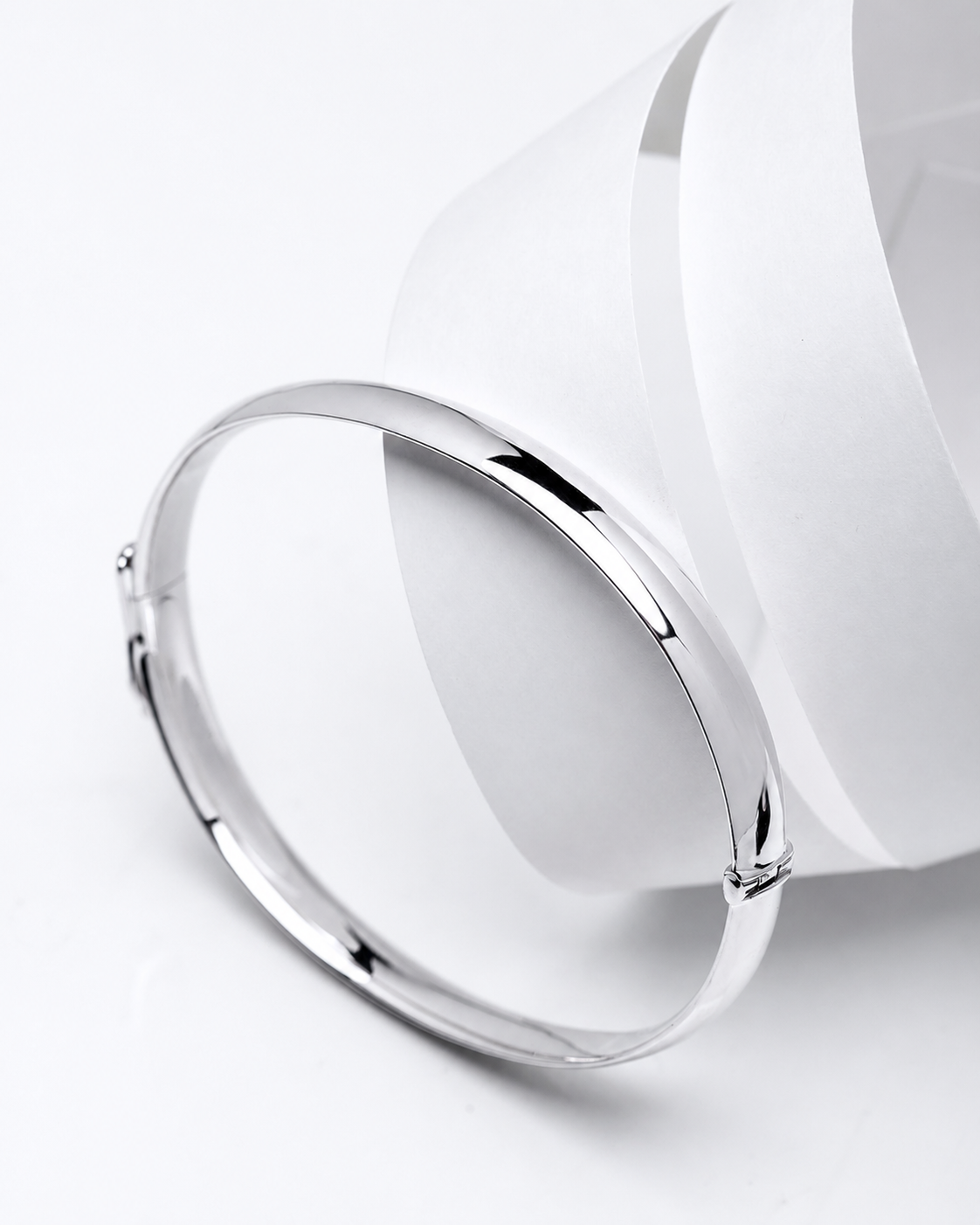 14k Gold white bangle on a white background