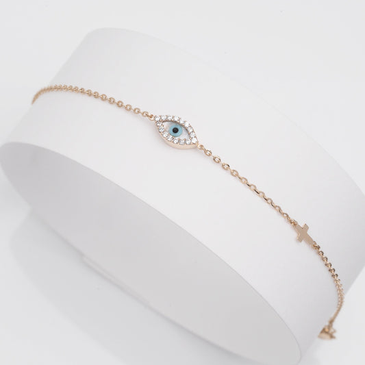 oval evil eye bracelet with cubic zirconia stones and small cross