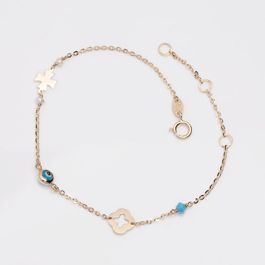 14k gold charm bracelet with evil eye, flower, cross, pearls, turquoise stone