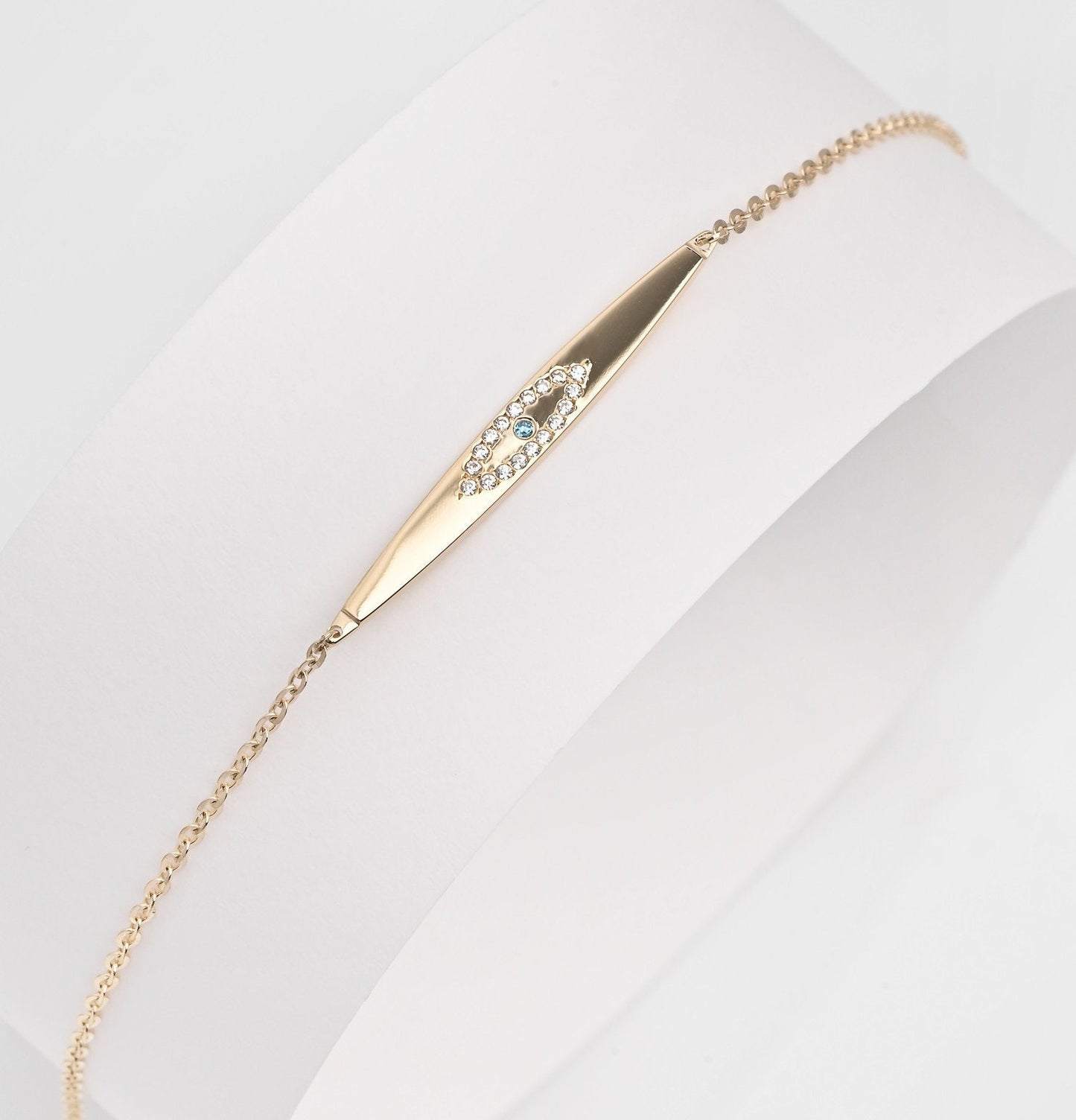 evil eye ID bracelet in 14k yellow gold 