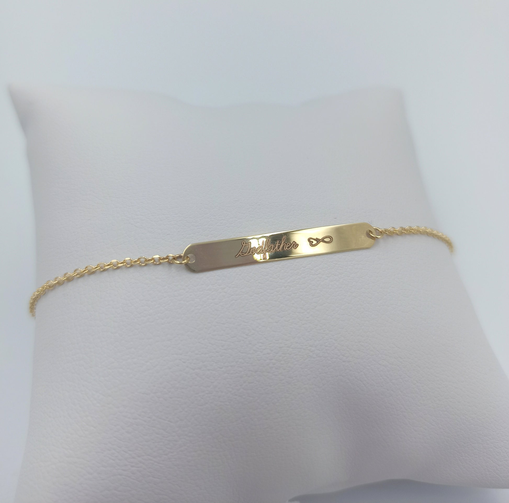 A delicate ID bracelet crafted in 14k gold, customizable for a personal touch.