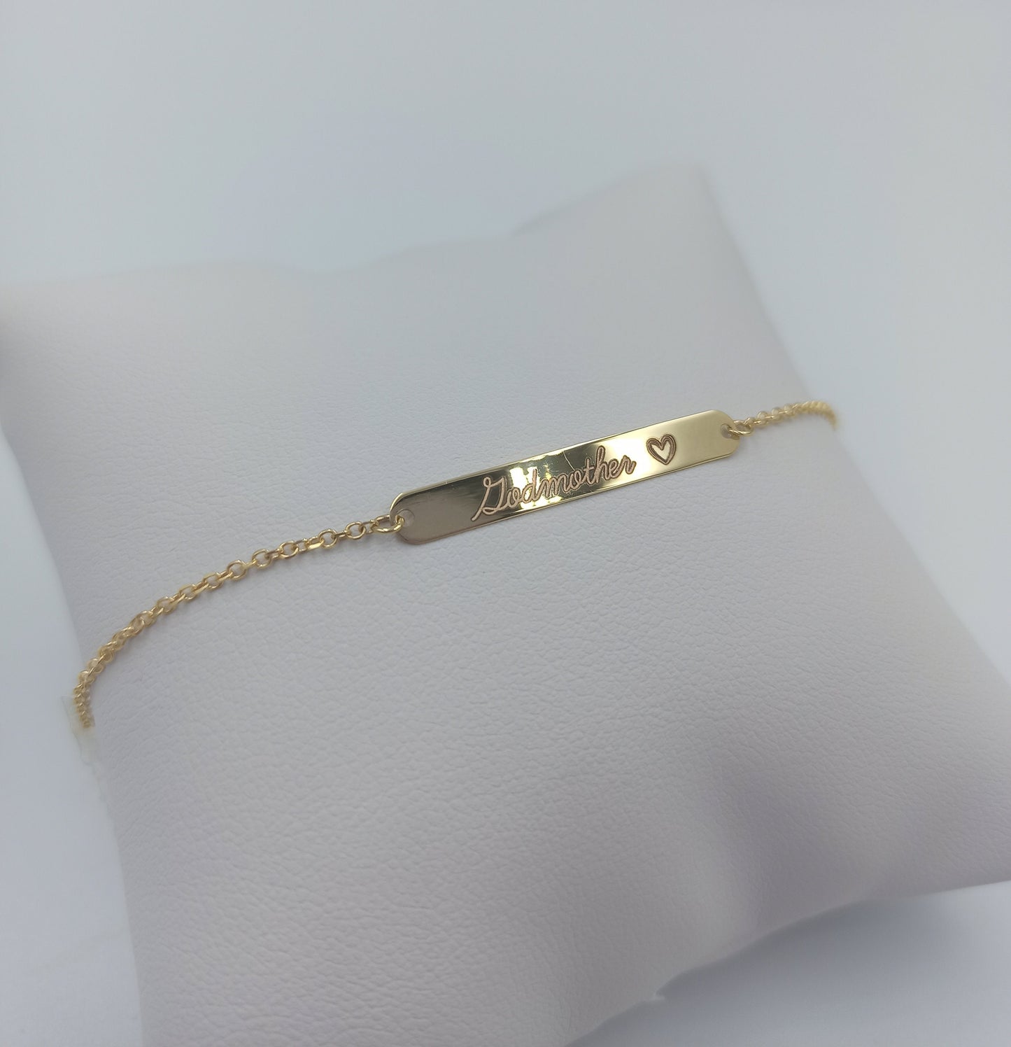 A delicate ID bracelet crafted in 14k gold, customizable for a personal touch.