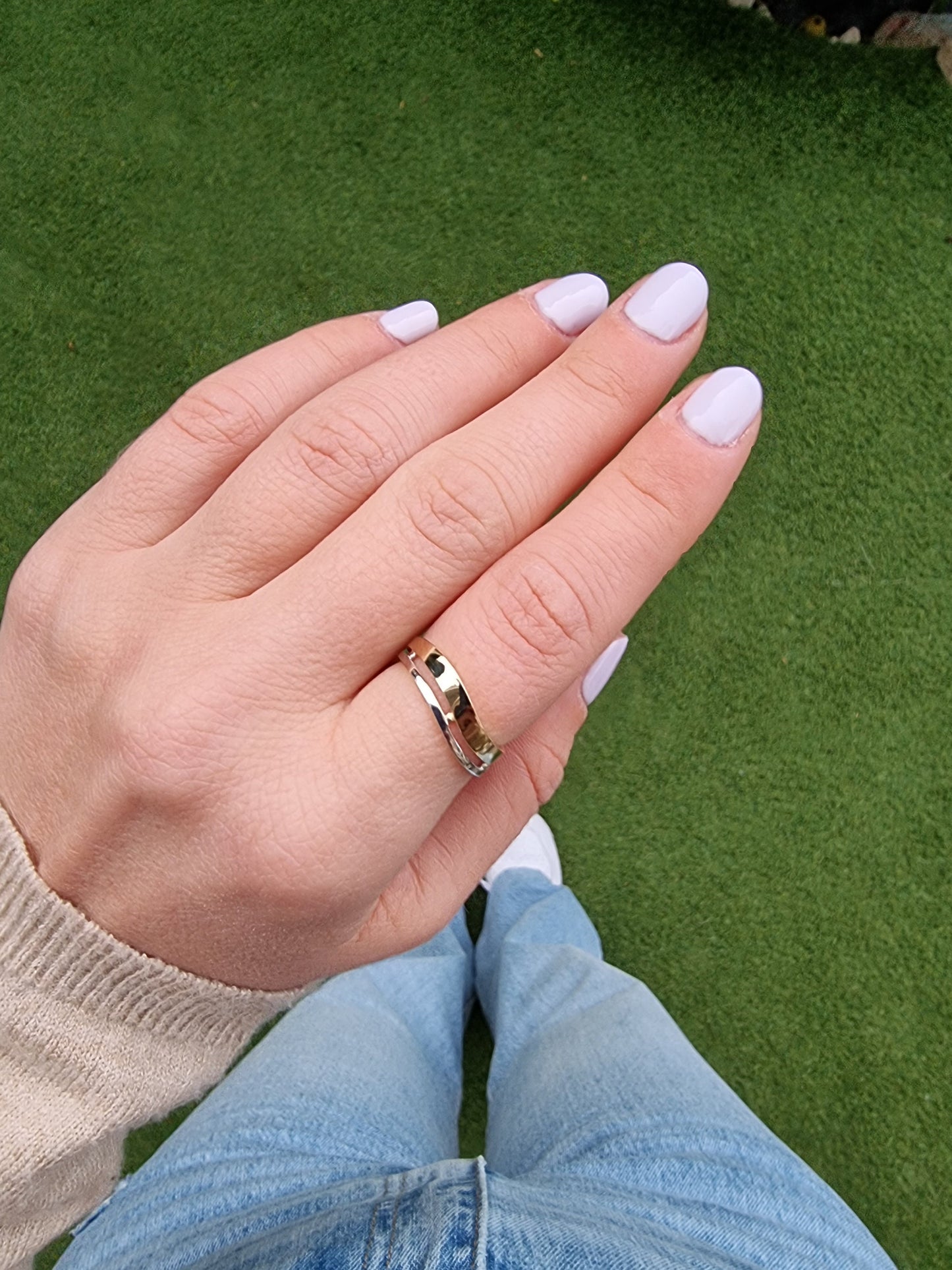 Asymmetric two-tone ring in 14k gold for women.