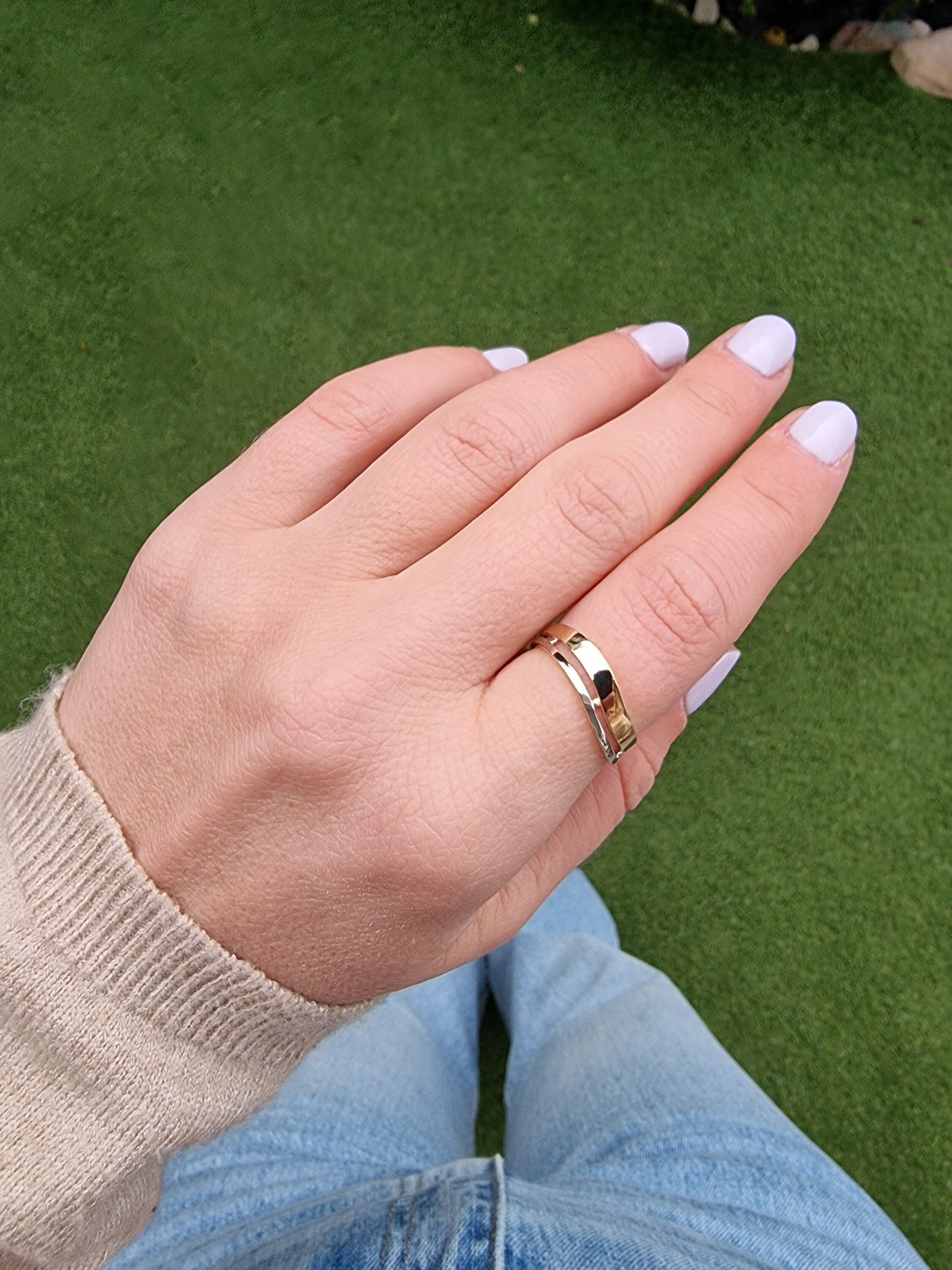 Asymmetric two-tone ring in 14k gold for women.