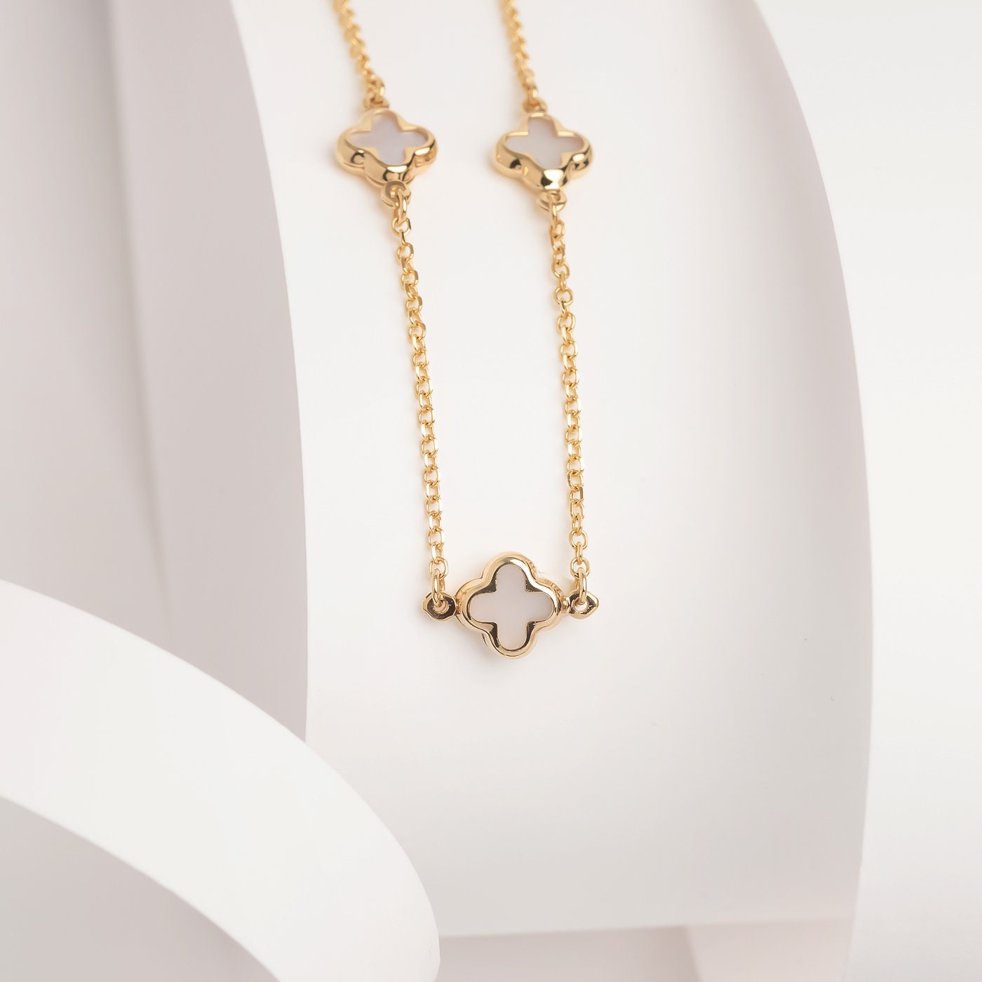 Dainty Mother of Pearl Four Leaf Clover Charm Bracelet in 14K Gold