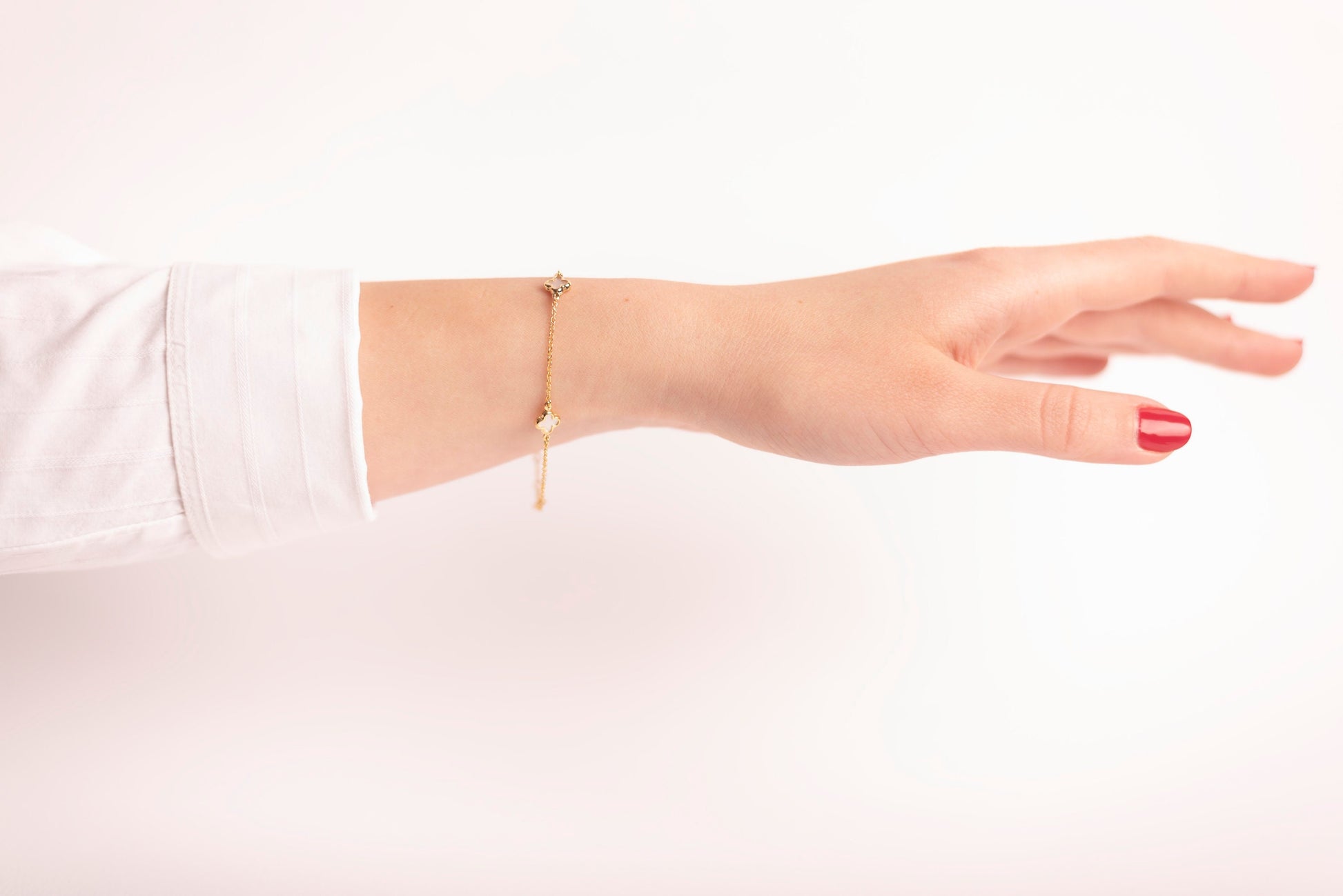 Elegant Mother of Pearl Four-Leaf Clover Bracelet in 14K Gold, Featuring Three Motifs