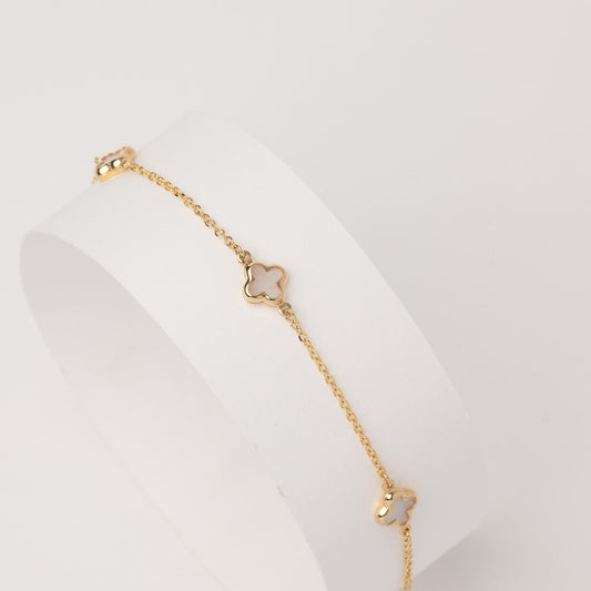 Elegant Mother of Pearl Four-Leaf Clover Bracelet in 14K Gold, Featuring Three Motifs