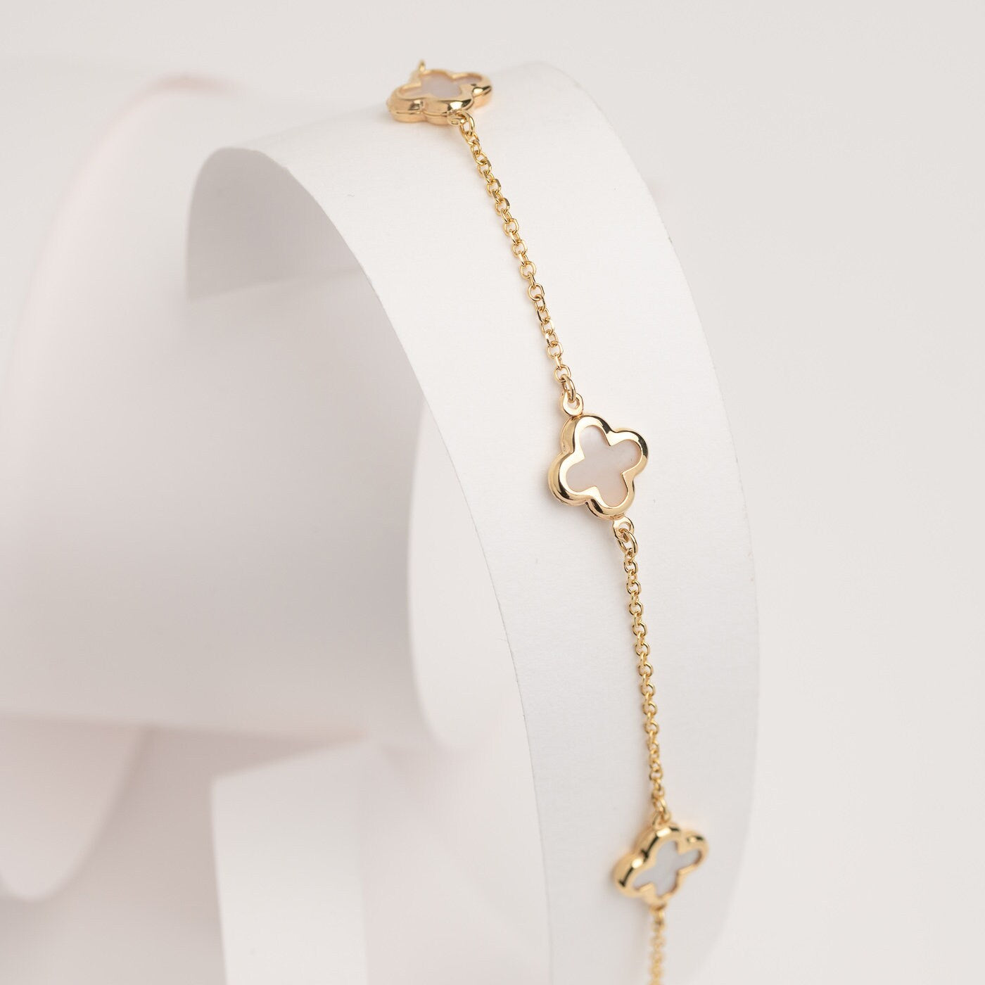 four leaf clover bracelet with 3 charms in 14k gold