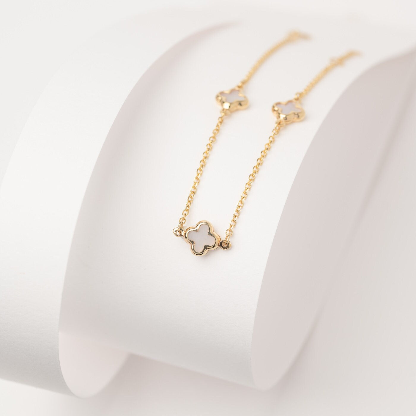 four leaf clover bracelet with 3 charms in 14k gold