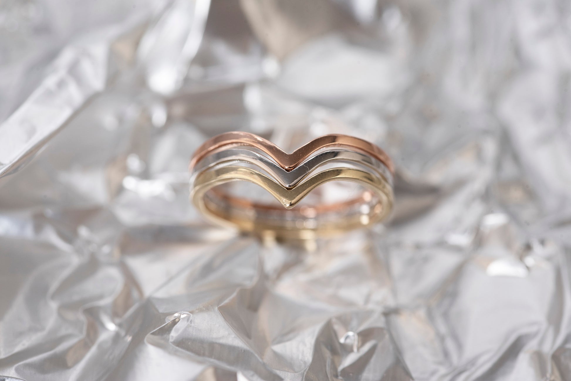 Handmade tri-tone triple chevron ring in 14k gold for women.