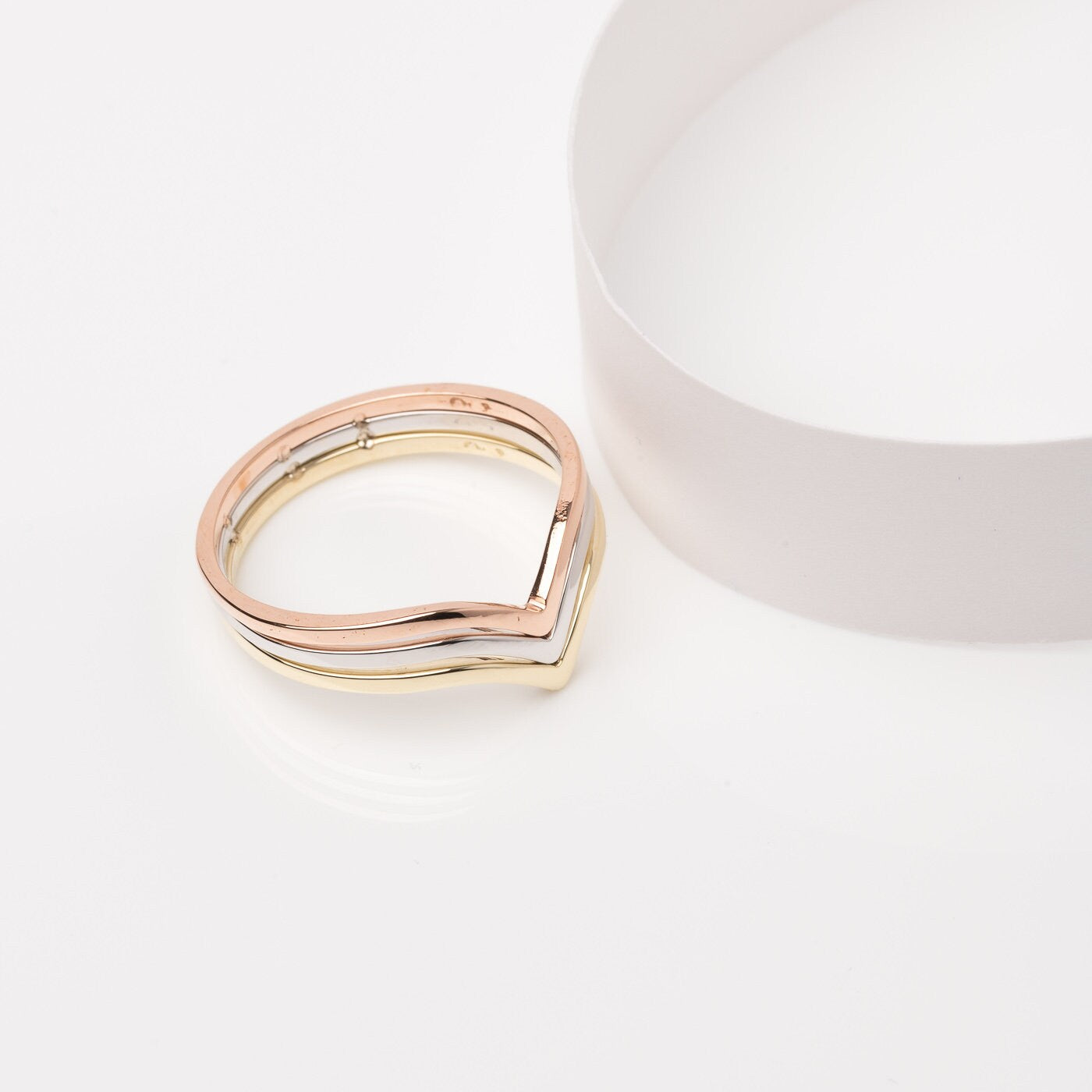 Handmade tri-tone triple chevron ring in 14k gold for women.