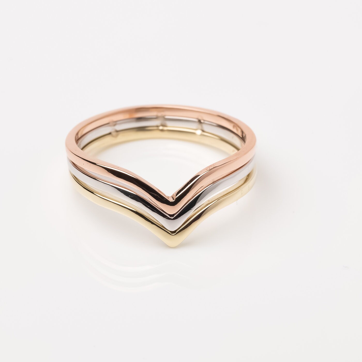 Handmade tri-tone triple chevron ring in 14k gold for women.