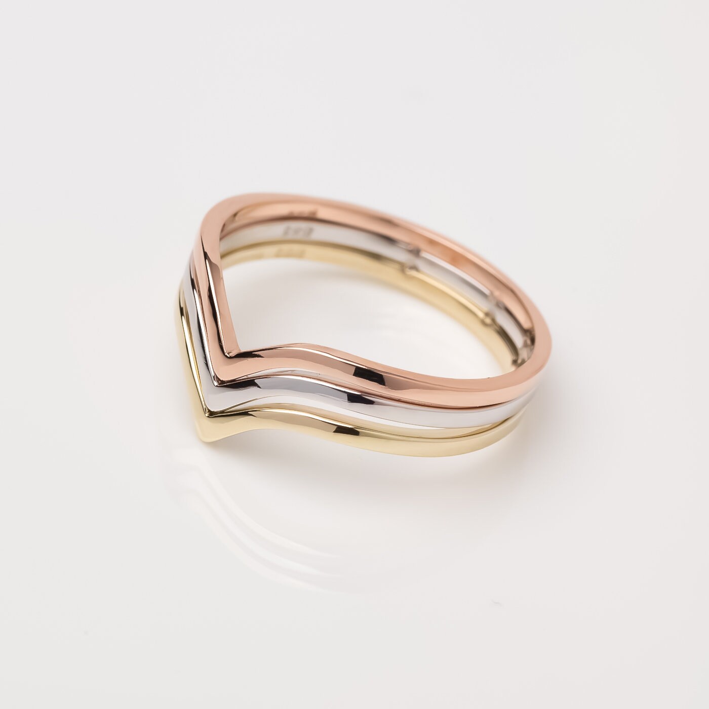 Handmade tri-tone triple chevron ring in 14k gold for women.