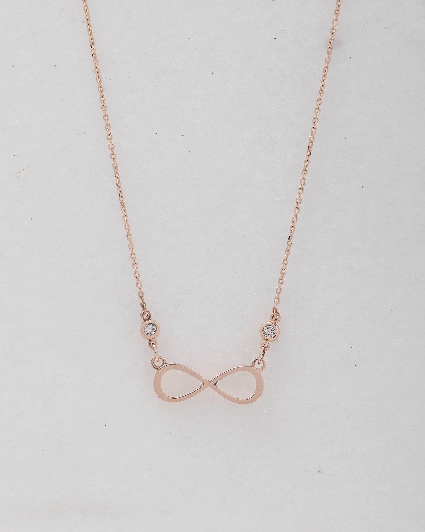 Rose Gold Infinity Necklace with Two Cubic Zirconia Stones