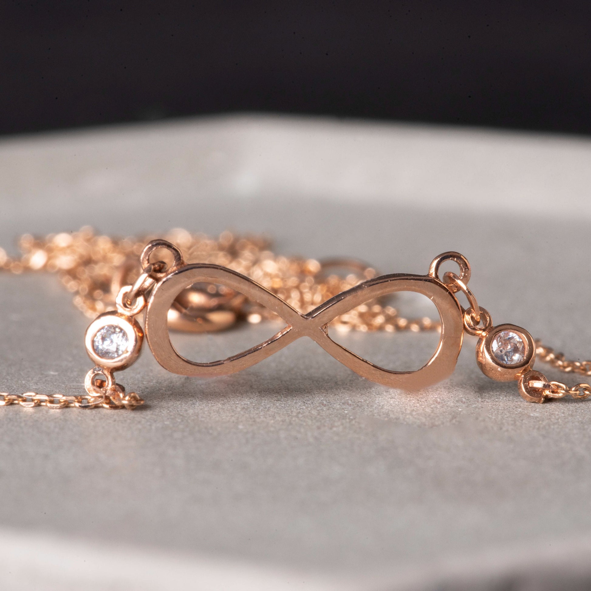 Rose Gold Infinity Necklace with Two Cubic Zirconia Stones