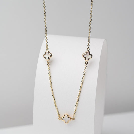 Elegant Four Leaf Clover Necklace featuring three mother-of-pearl motifs set in 14k gold.