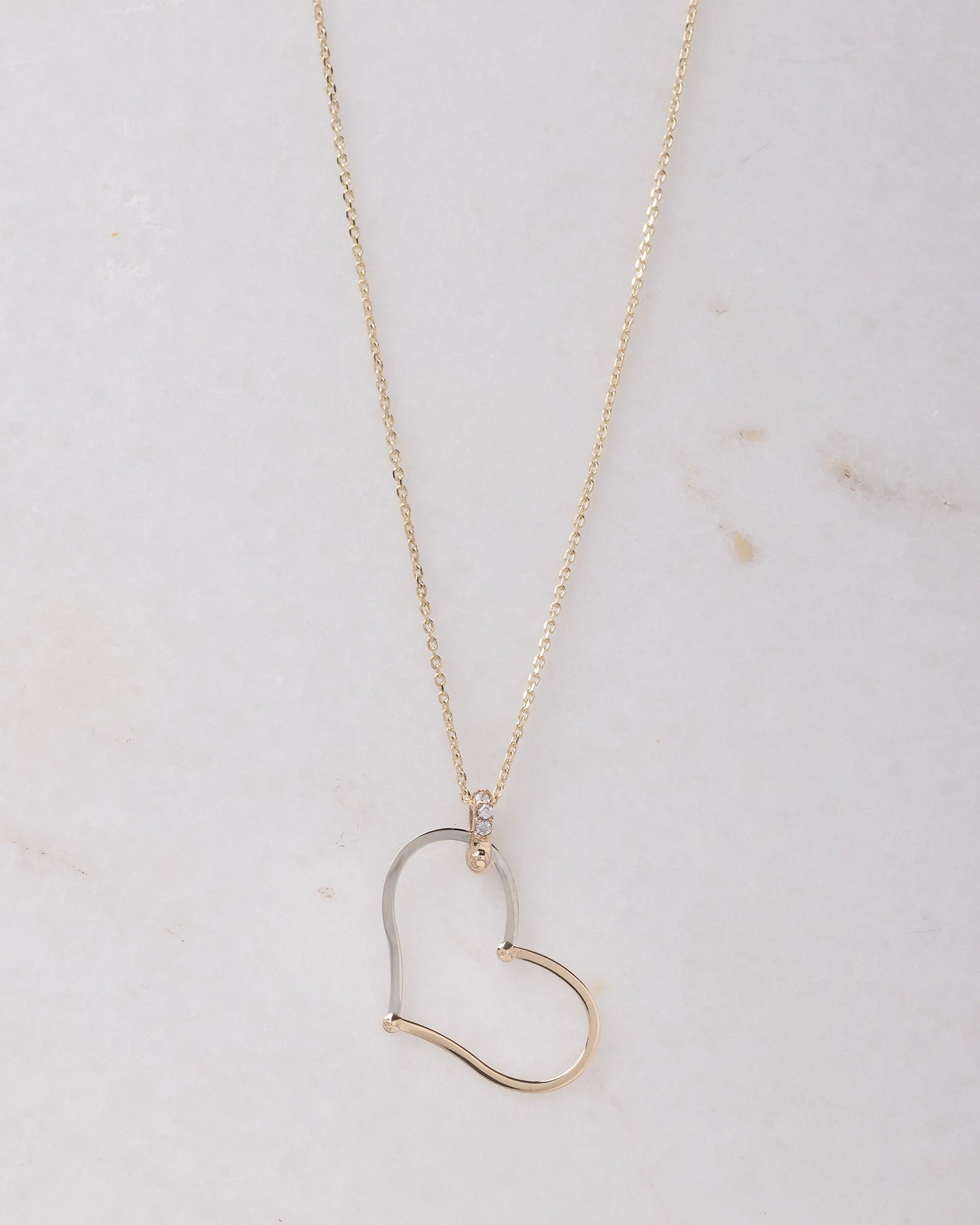 Large Heart Necklace in 14k solid gold with cubic zirconia stones on the loop