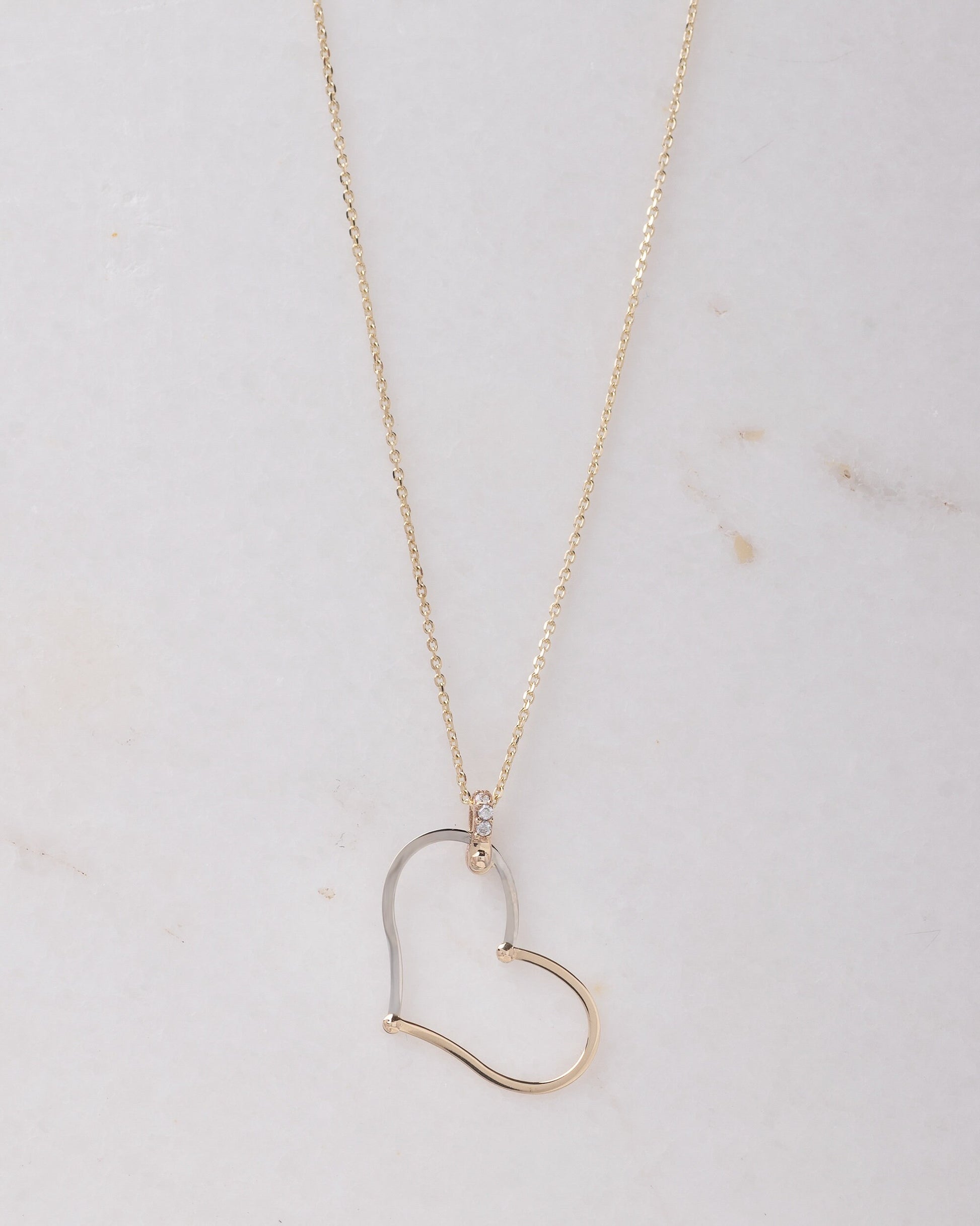 Large Heart Necklace in 14k solid gold with cubic zirconia stones on the loop