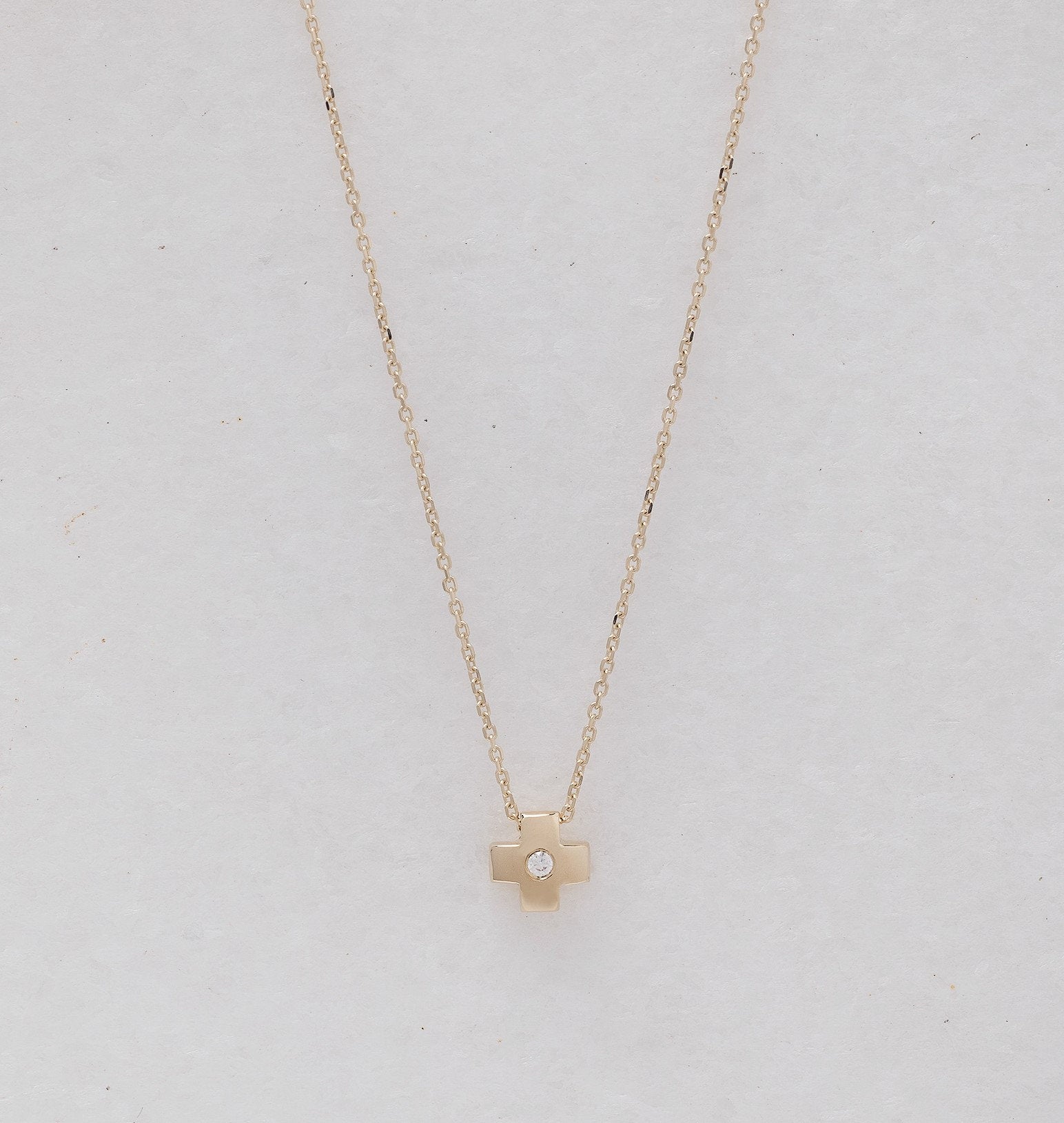 small diamond cross necklace in 14k gold for women