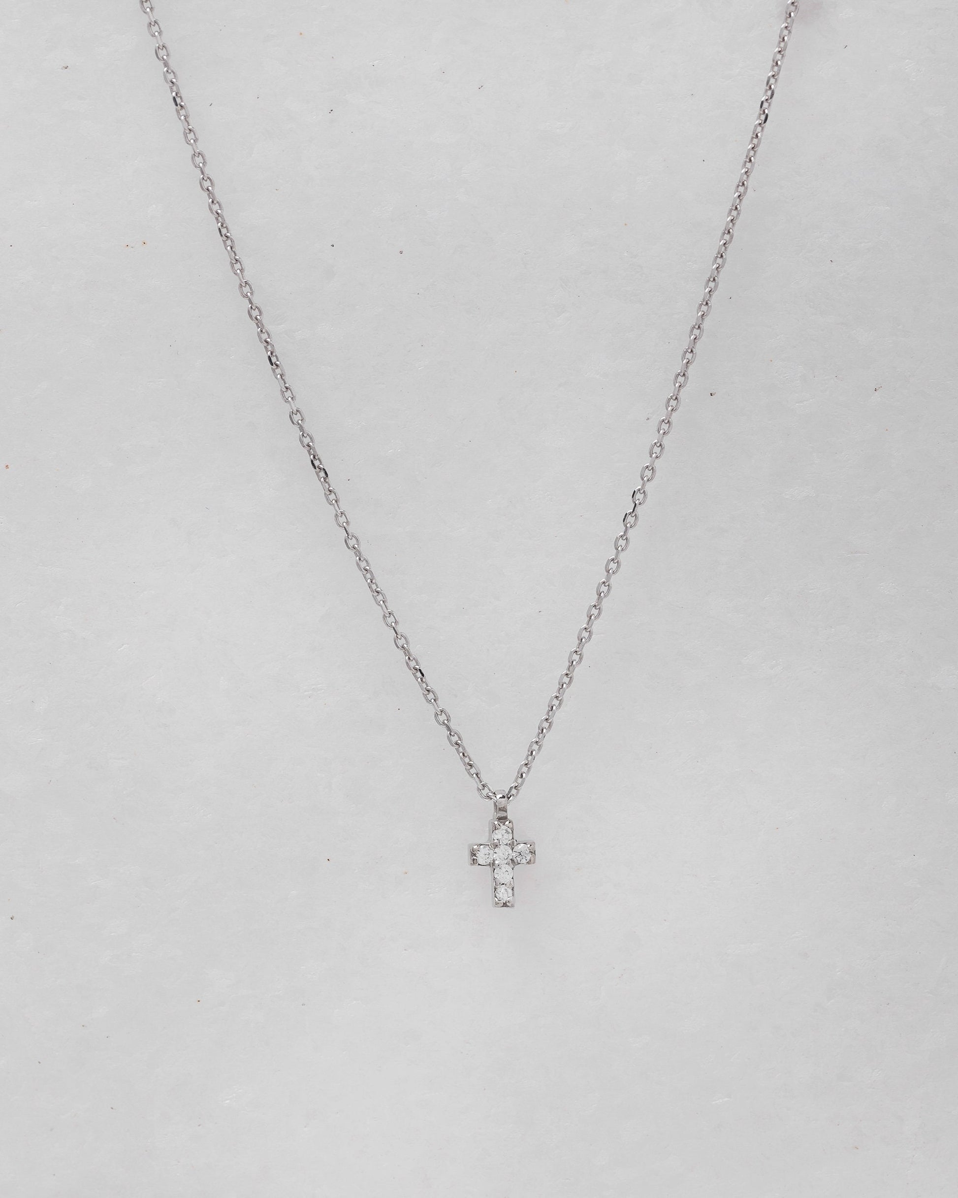 tiny diamond cross necklace in 14k white gold for women