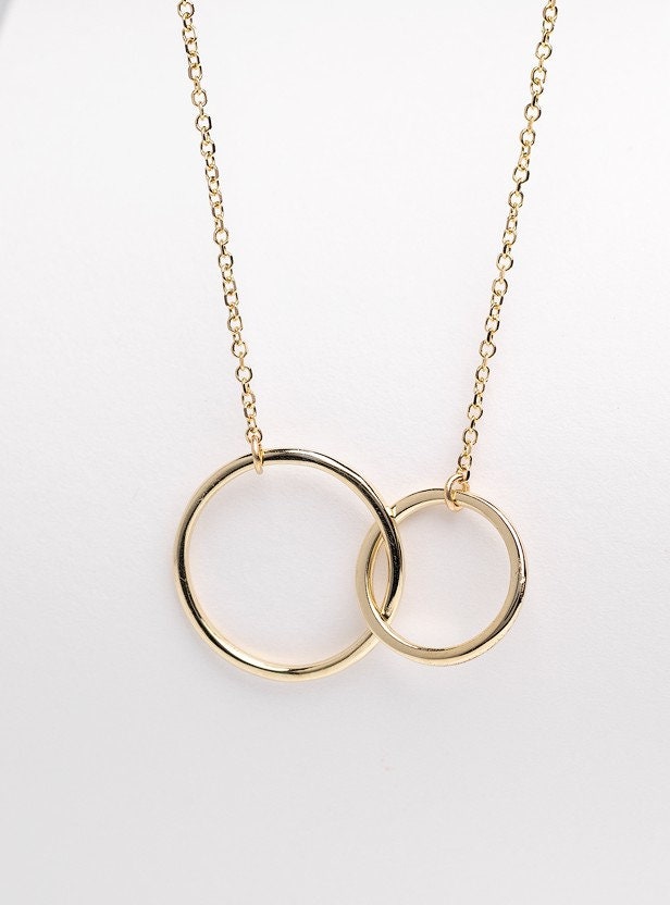 14k gold necklace with two interlocking circles 