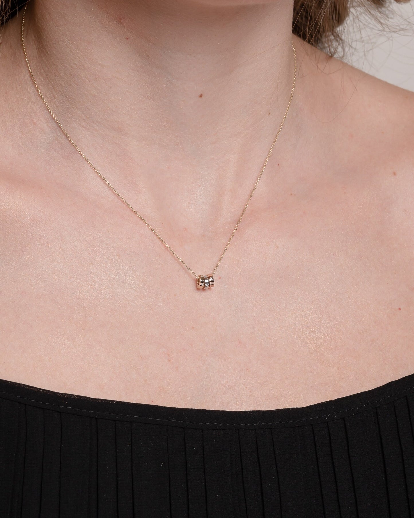 diamond 18K Solid Gold Necklace with 3 circles in yellow-white-rose gold worn by a model 