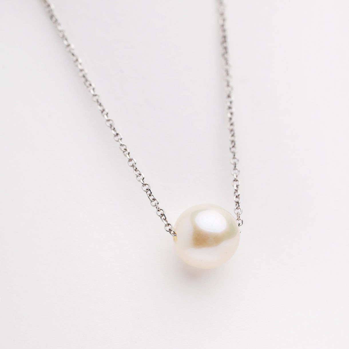 Pearl Necklace Floating in 14k White Gold