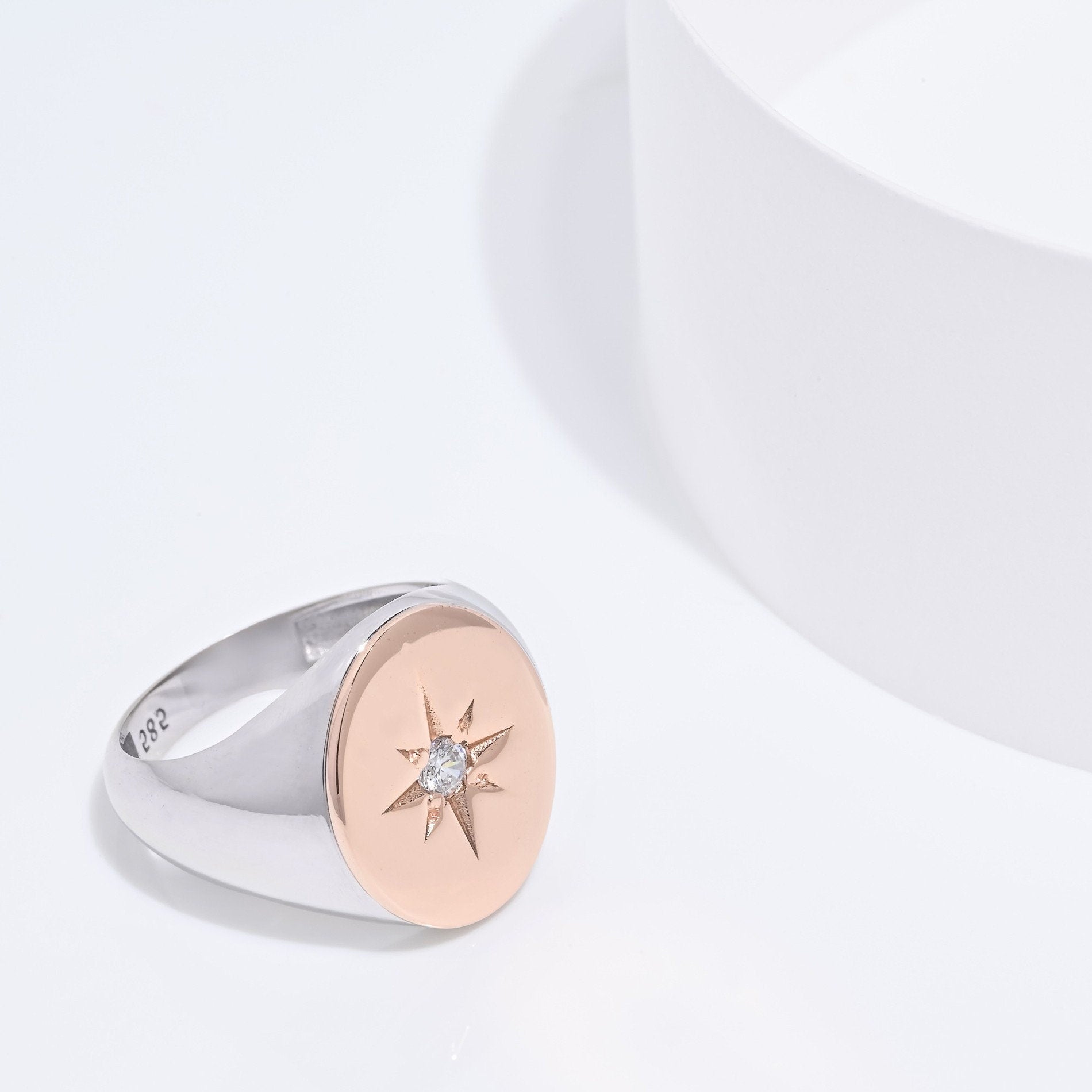 A two tone star signet ring crafted in 14k solid gold for women.