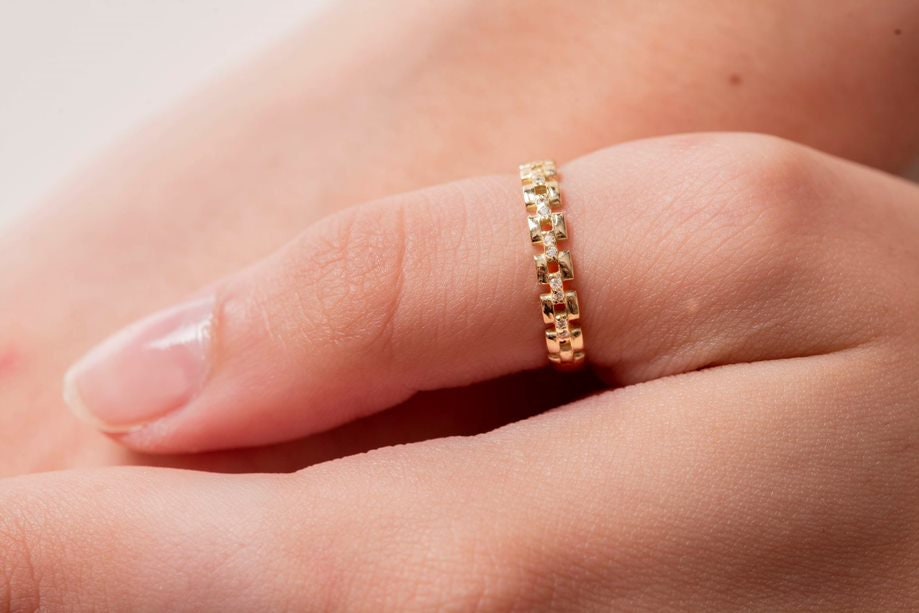 Handcrafted Cuban Link Chain Ring in 14k gold, adorned with white cubic zirconia stones, designed for women.