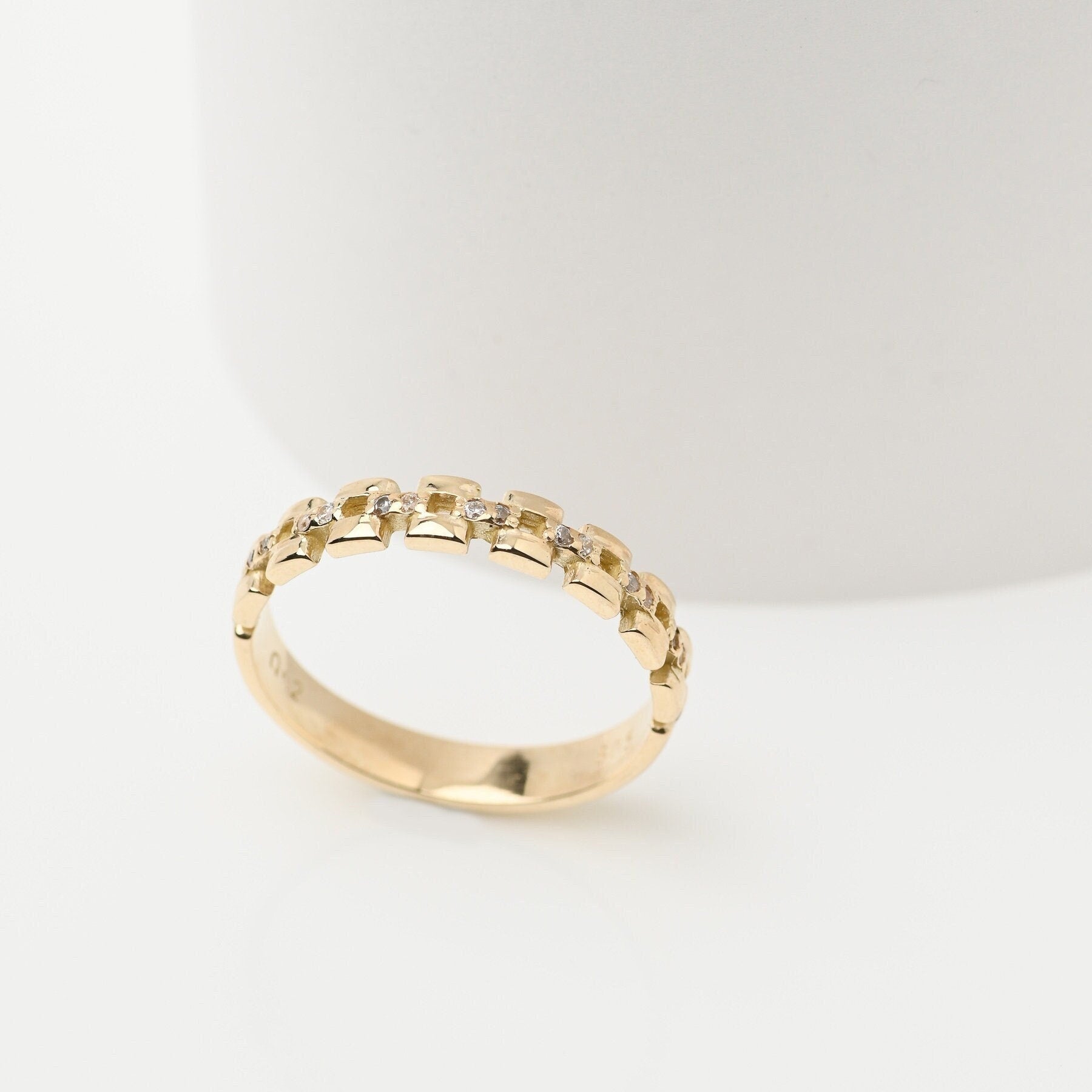 Handcrafted Cuban Link Chain Ring in 14k gold, adorned with white cubic zirconia stones, designed for women.