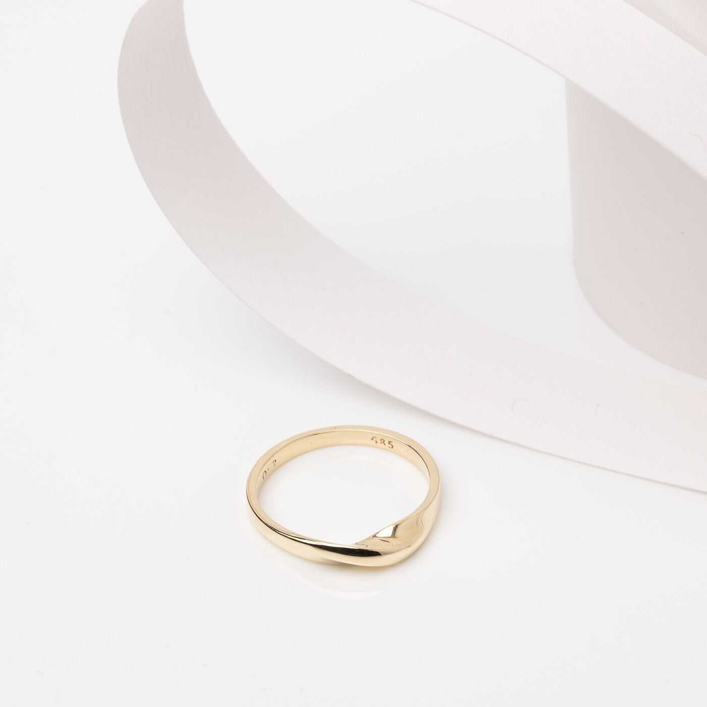 Handmade Möbius ring in 14k solid gold for women.