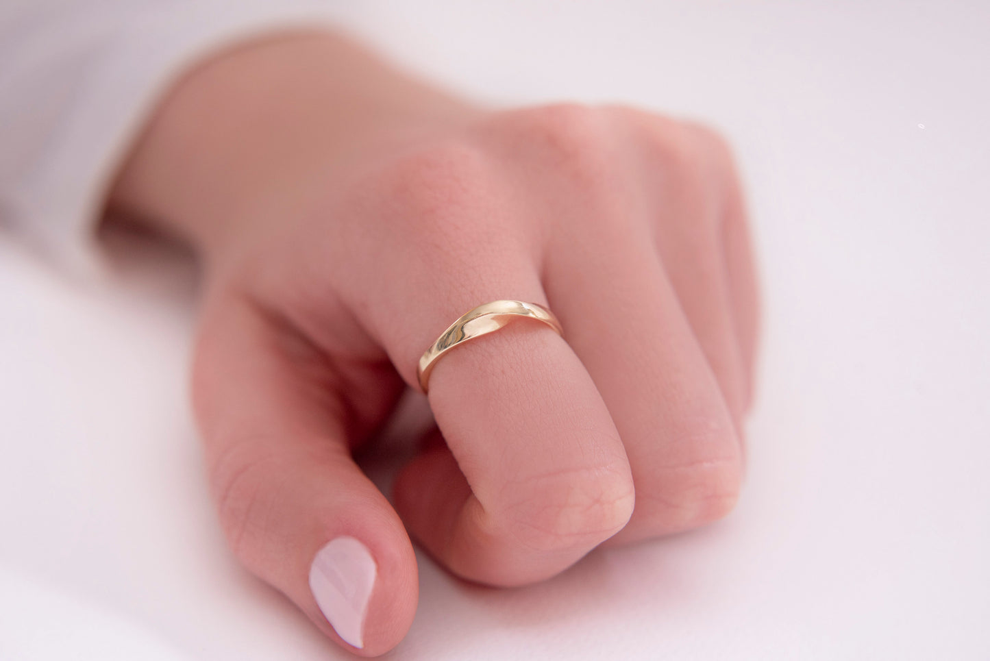 Handmade Möbius ring in 14k solid gold for women.