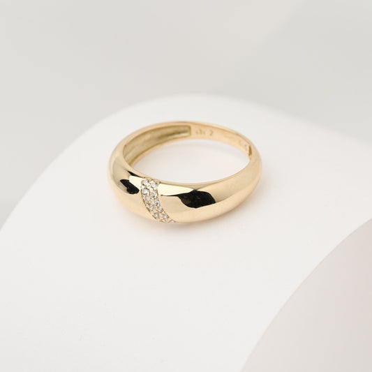 Handmade dome ring in 14k solid gold, partially paved with white cubic zirconia stones.