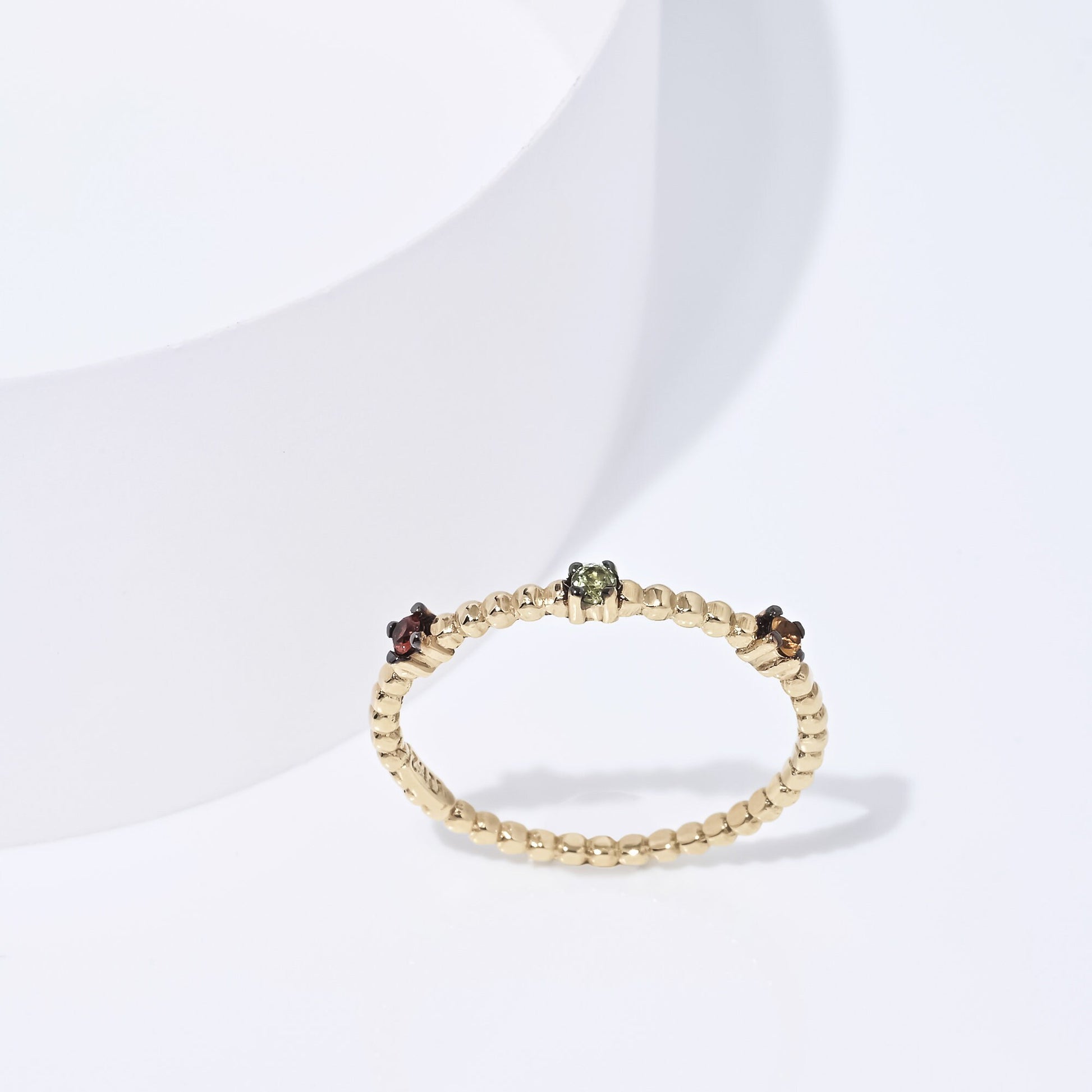 Handmade beaded ring in 14k solid gold with three semi-precious stones.