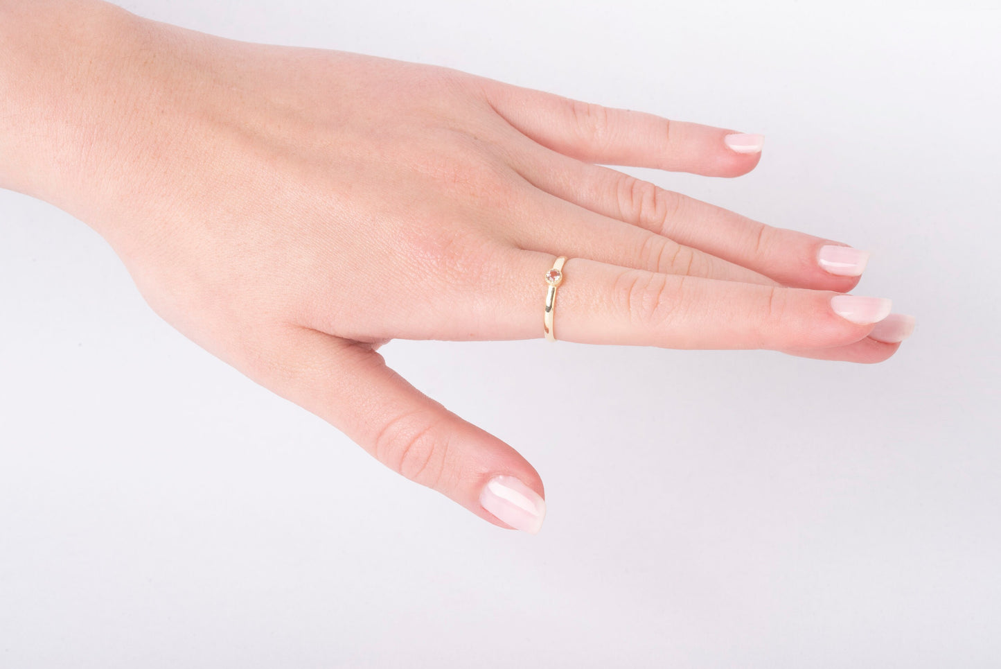 Handcrafted birthstone ring for women, set in 14k gold with a prong setting.