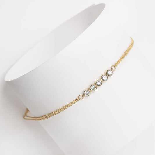 Family birthstone bracelet with five stones, crafted in 14k gold with a double chain for women.