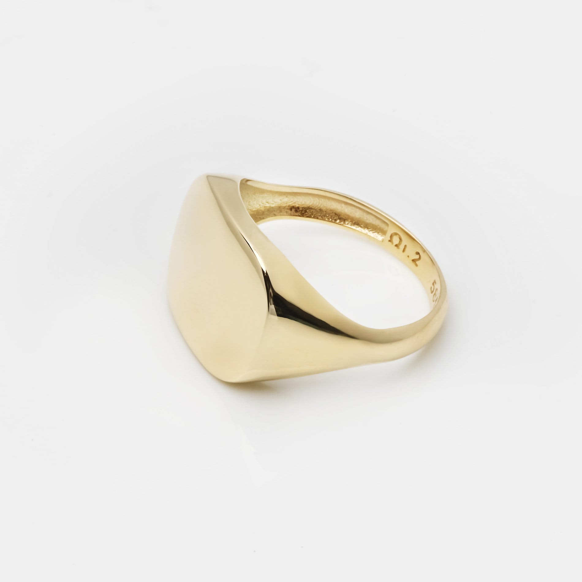 A square signet ring for women, crafted in 14k gold, customizable for a personal touch.