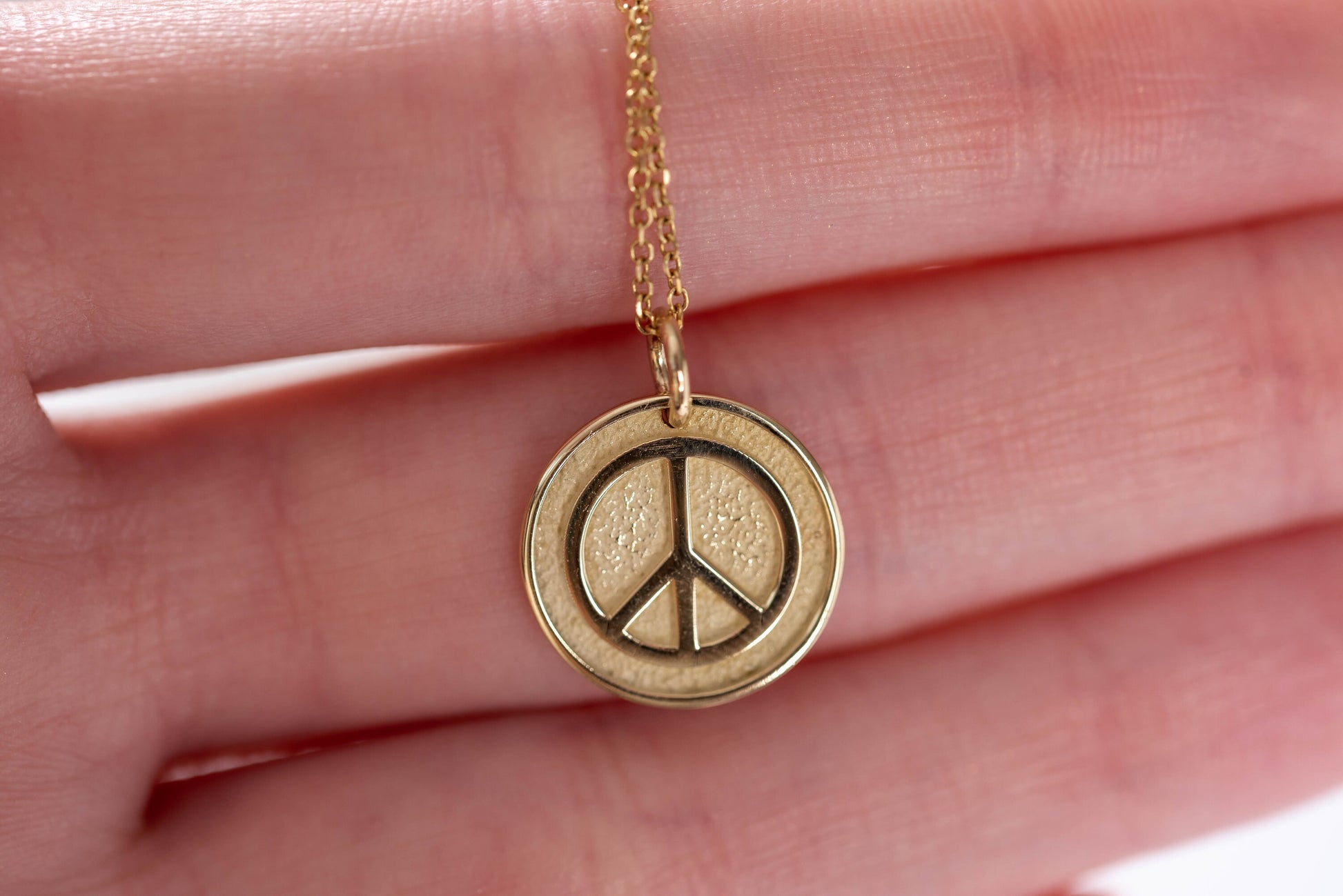 14k Solid Gold Necklace for women, featuring a Peace Symbol with complimentary engraving on the reverse side.