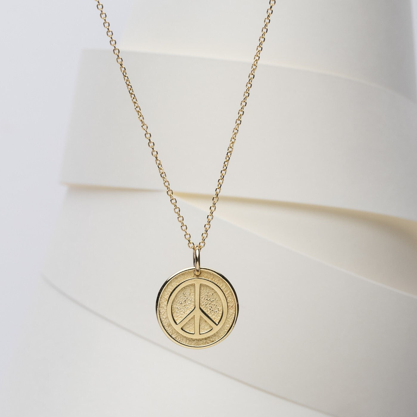 14k Solid Gold Necklace for women, featuring a Peace Symbol with complimentary engraving on the reverse side.