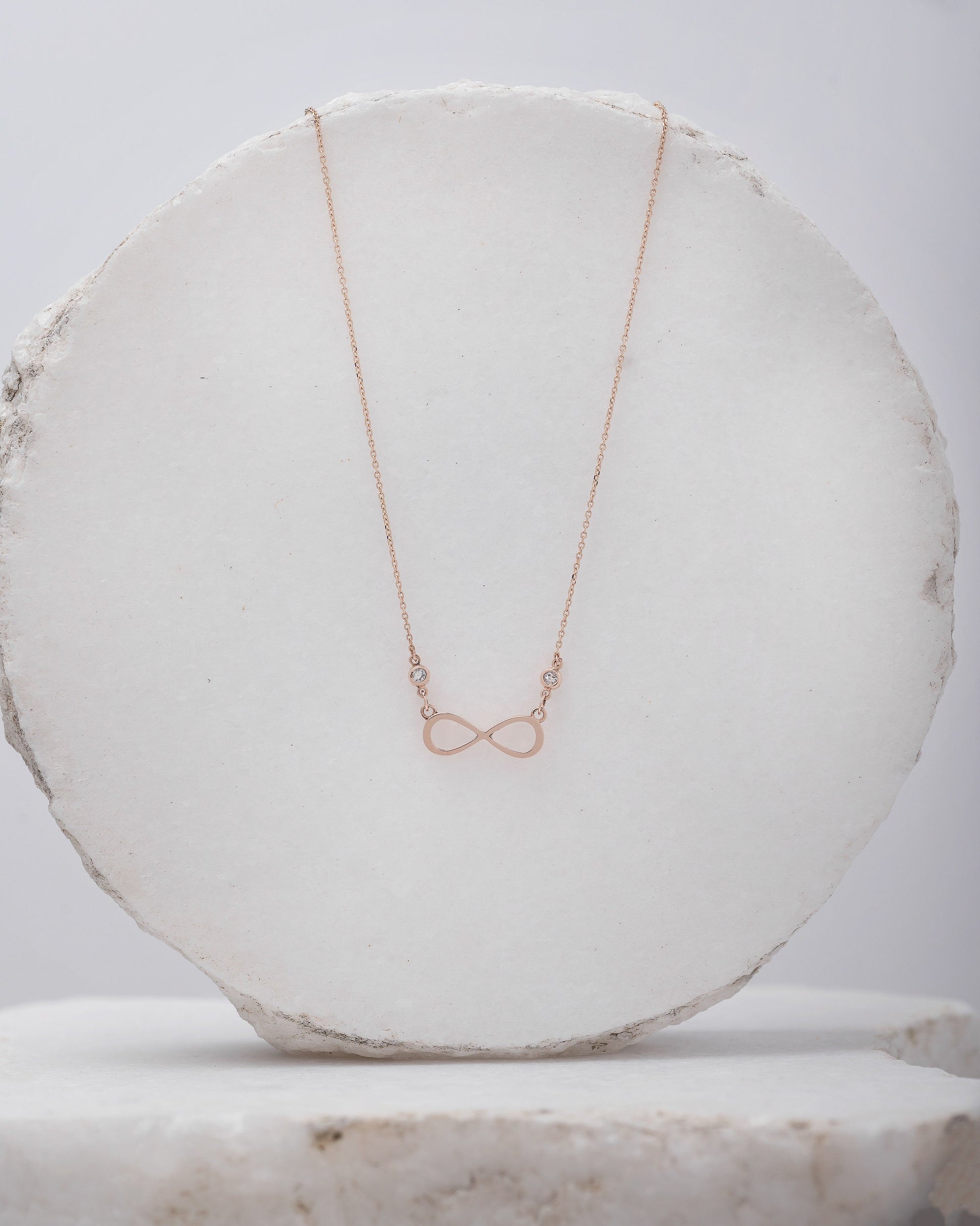 Rose Gold Infinity Necklace with Two Cubic Zirconia Stones