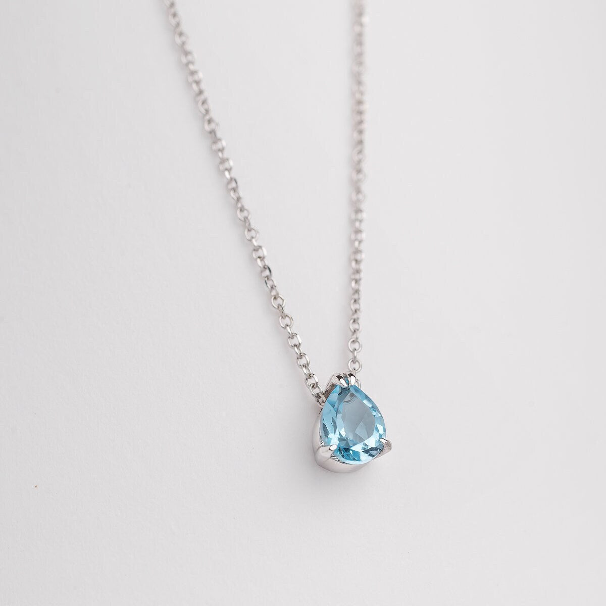 drop  blue aquamarine necklace in 14k white gold