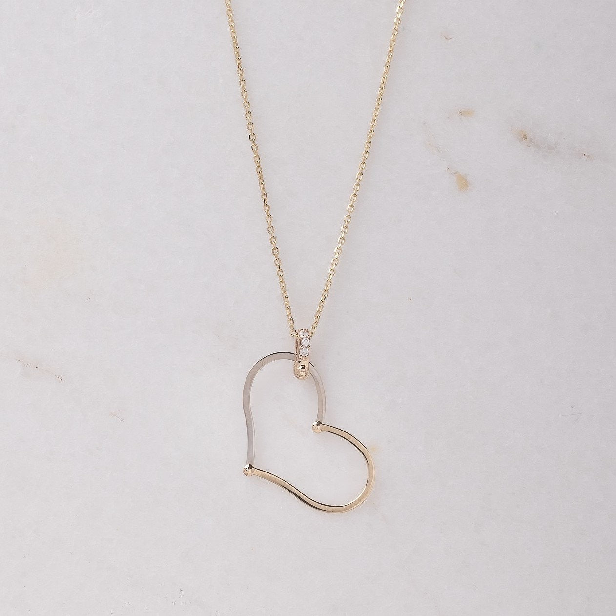 Large Heart Necklace in 14k solid gold with cubic zirconia stones on the loop