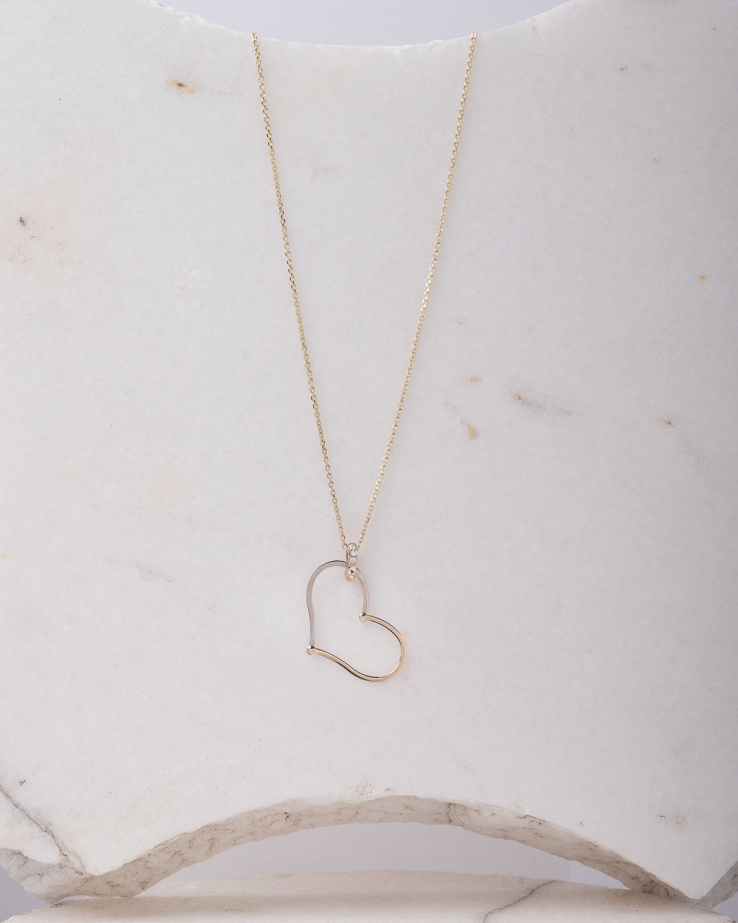 Large Heart Necklace in 14k solid gold with cubic zirconia stones on the loop